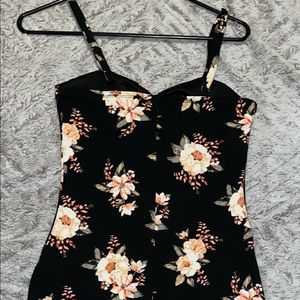 Junior size dress 3-5. Black floral straps. Brand new. Never worn. No tags
